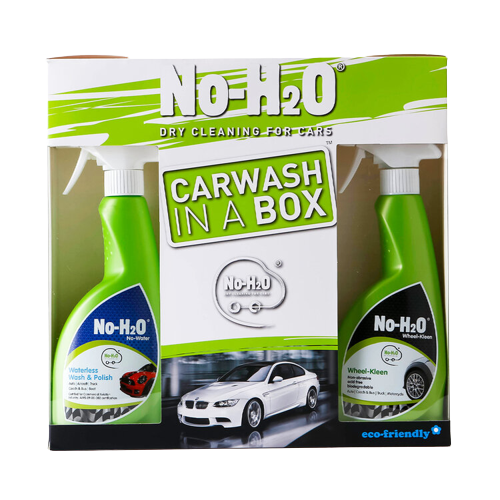 A "No-H2O" Carwash In A Box set. The set includes two products: a "Waterless Wash & Polish" spray and a "Wheel-Kleen" spray. These products are designed for dry cleaning of cars without the need for water, emphasising its eco-friendly attributes. The packaging also showcases a car image, highlighting its primary application.