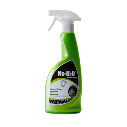 A "No-H2O" product labelled as "Wheel-Kleen." The spray bottle indicates that it's designed specifically for cleaning wheels. The green bottle features an image of a wheel, suggesting its primary use for vehicle wheel cleaning. The product appears to be part of a range that promotes eco-friendly cleaning solutions, especially given its waterless cleaning capability. The tagline "Clean, condition & protect" suggests multiple benefits from using this product.