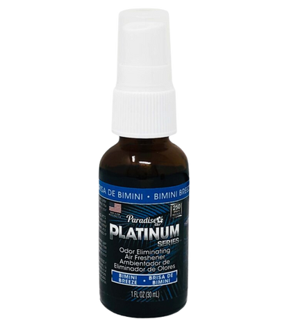 A spray bottle labeled "Paradise Platinum Series" that's an odour eliminating air freshener with the scent "Bimini Breeze". It's a 1 fl oz (30ml) bottle.