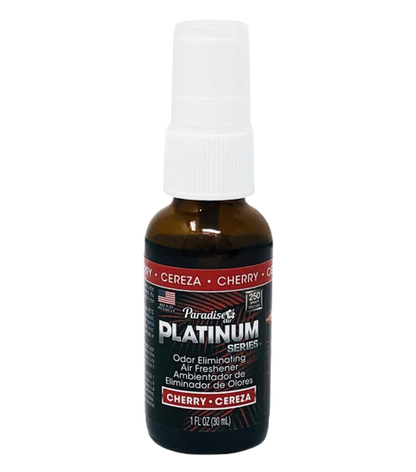 A spray bottle labeled "Paradise Platinum Series" that's an odour eliminating air freshener with the scent "Cherry". It's a 1 fl oz (30ml) bottle.