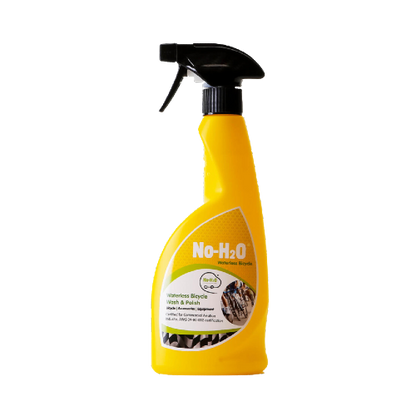 A "No-H2O" Multipurpose Bicycle-Kleen spray in a yellow bottle. It's eco-friendly and formulated to clean bicycles efficiently without the need for water.